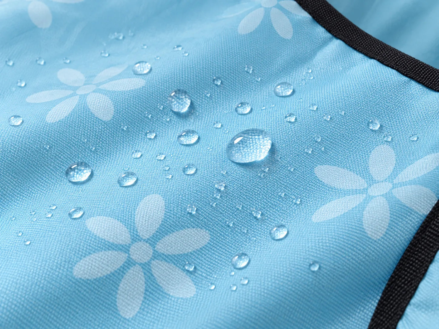 Water beading on the baby blue 600D Oxford fabric